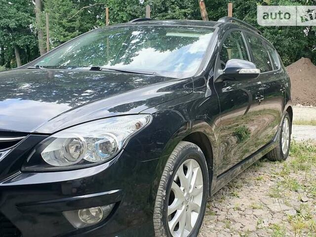 Чорний Хендай i30, об'ємом двигуна 1.6 л та пробігом 233 тис. км за 6700 $, фото 1 на Automoto.ua