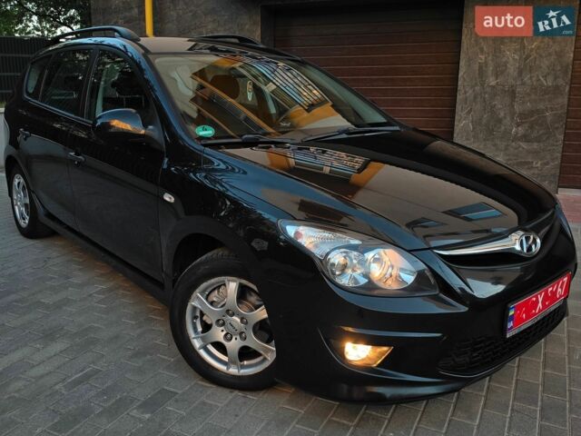 Черный Хендай i30, объемом двигателя 1.6 л и пробегом 190 тыс. км за 7099 $, фото 2 на Automoto.ua