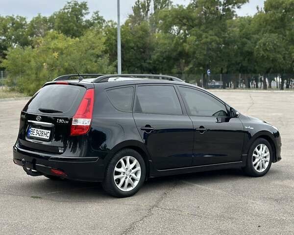 Черный Хендай i30, объемом двигателя 1.4 л и пробегом 137 тыс. км за 7500 $, фото 13 на Automoto.ua