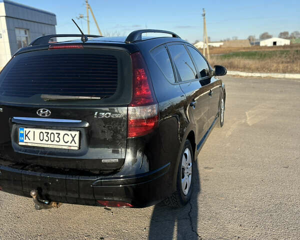 Чорний Хендай i30, об'ємом двигуна 1.6 л та пробігом 255 тис. км за 6500 $, фото 6 на Automoto.ua