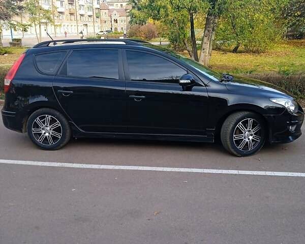 Черный Хендай i30, объемом двигателя 1.4 л и пробегом 224 тыс. км за 7500 $, фото 3 на Automoto.ua