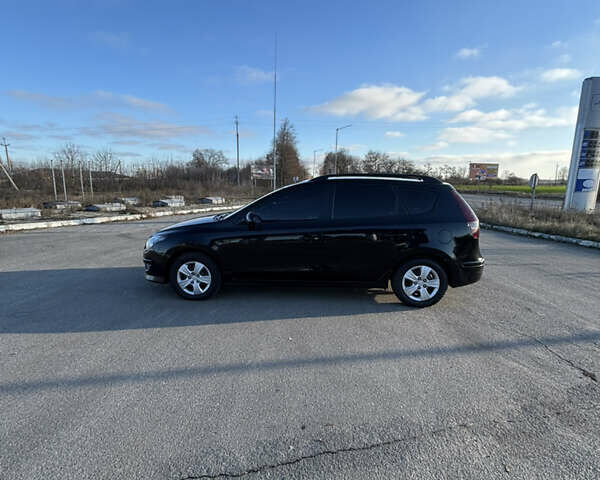 Чорний Хендай i30, об'ємом двигуна 1.6 л та пробігом 255 тис. км за 6500 $, фото 3 на Automoto.ua