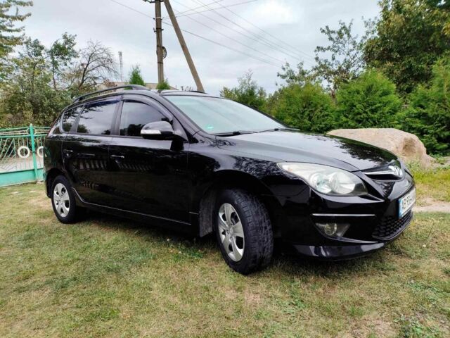 Черный Хендай i30, объемом двигателя 1.6 л и пробегом 180 тыс. км за 6700 $, фото 1 на Automoto.ua