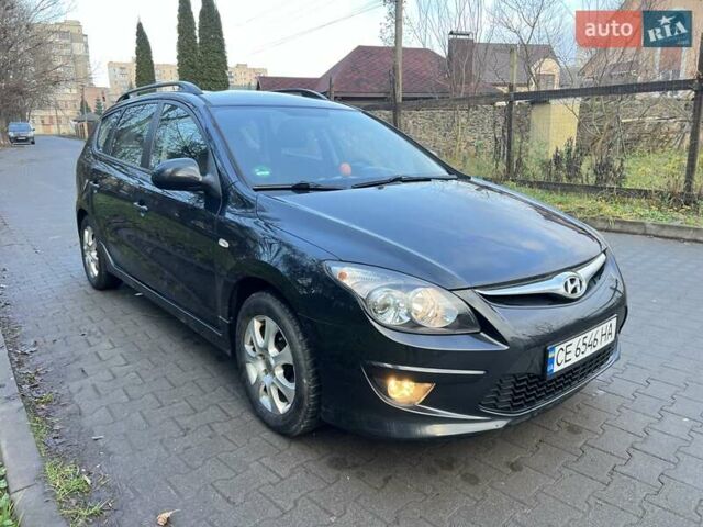 Черный Хендай i30, объемом двигателя 1.4 л и пробегом 187 тыс. км за 5550 $, фото 1 на Automoto.ua