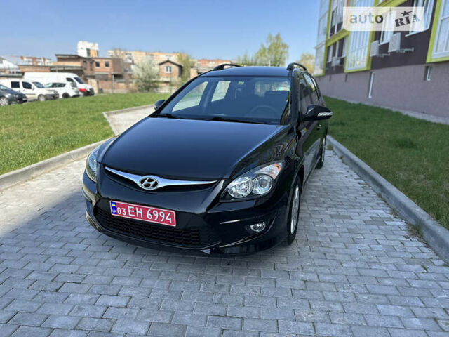 Чорний Хендай i30, об'ємом двигуна 1.6 л та пробігом 105 тис. км за 9500 $, фото 1 на Automoto.ua