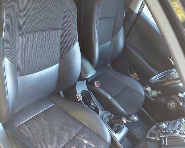 Черный Хендай i30, объемом двигателя 1.58 л и пробегом 248 тыс. км за 7200 $, фото 2 на Automoto.ua