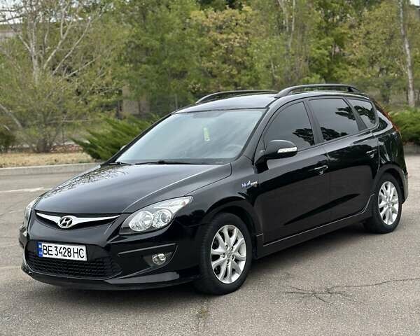 Черный Хендай i30, объемом двигателя 1.4 л и пробегом 137 тыс. км за 7500 $, фото 22 на Automoto.ua