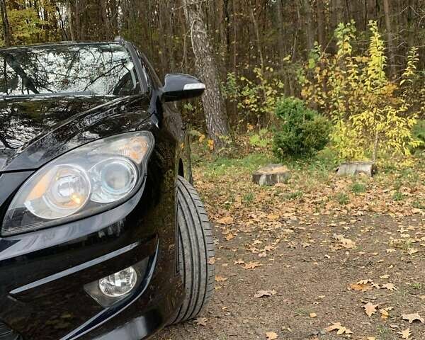 Черный Хендай i30, объемом двигателя 1.58 л и пробегом 235 тыс. км за 6700 $, фото 2 на Automoto.ua
