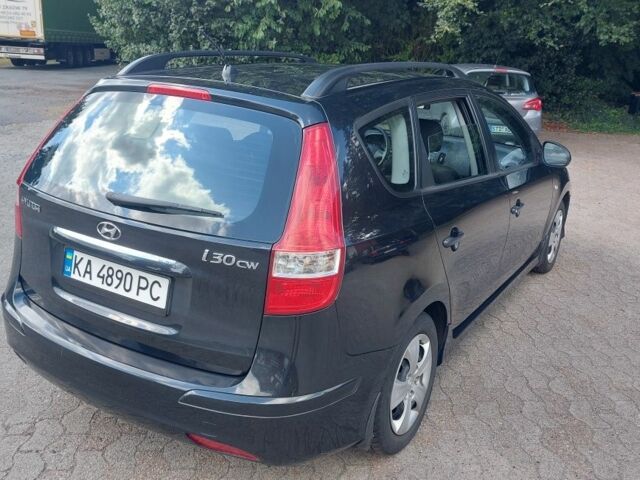 Чорний Хендай i30, об'ємом двигуна 1.4 л та пробігом 222 тис. км за 5800 $, фото 6 на Automoto.ua