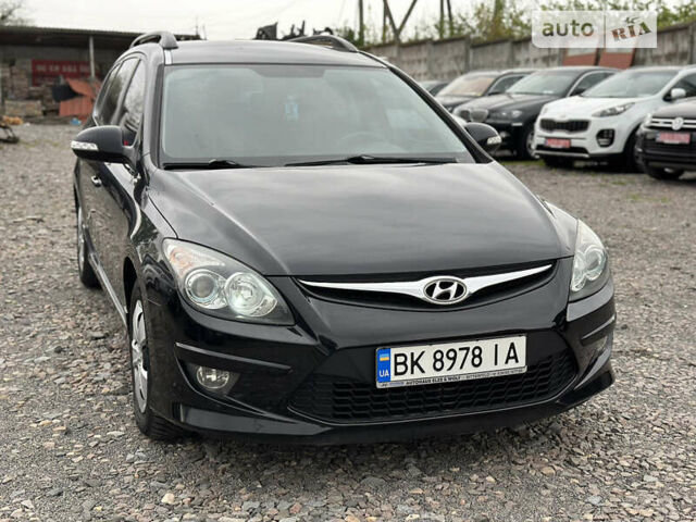 Чорний Хендай i30, об'ємом двигуна 1.6 л та пробігом 177 тис. км за 7200 $, фото 7 на Automoto.ua