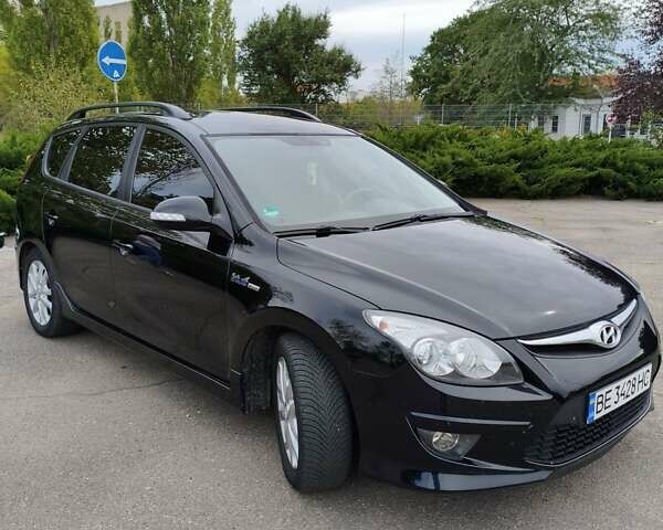 Черный Хендай i30, объемом двигателя 1.4 л и пробегом 137 тыс. км за 7500 $, фото 4 на Automoto.ua