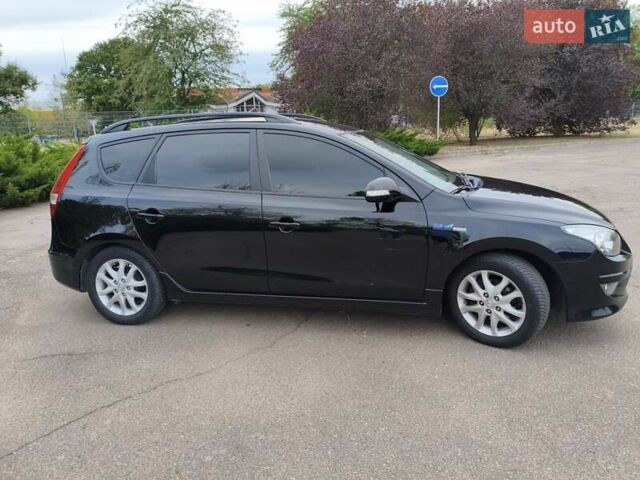 Черный Хендай i30, объемом двигателя 1.4 л и пробегом 137 тыс. км за 7500 $, фото 7 на Automoto.ua