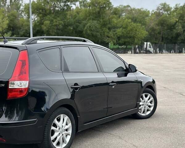 Черный Хендай i30, объемом двигателя 1.4 л и пробегом 137 тыс. км за 7500 $, фото 14 на Automoto.ua