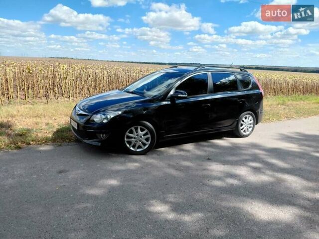 Черный Хендай i30, объемом двигателя 1.58 л и пробегом 248 тыс. км за 7200 $, фото 8 на Automoto.ua