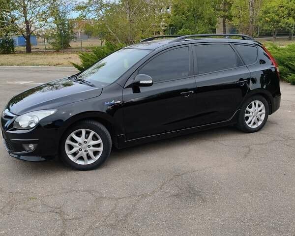 Черный Хендай i30, объемом двигателя 1.4 л и пробегом 137 тыс. км за 7500 $, фото 9 на Automoto.ua