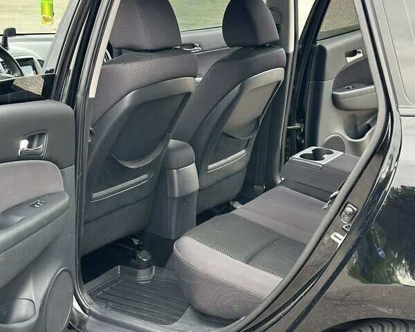 Черный Хендай i30, объемом двигателя 1.4 л и пробегом 137 тыс. км за 7500 $, фото 37 на Automoto.ua