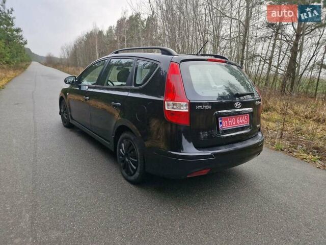 Черный Хендай i30, объемом двигателя 1.6 л и пробегом 232 тыс. км за 7000 $, фото 9 на Automoto.ua