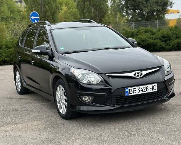 Черный Хендай i30, объемом двигателя 1.4 л и пробегом 137 тыс. км за 7500 $, фото 21 на Automoto.ua