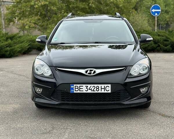 Черный Хендай i30, объемом двигателя 1.4 л и пробегом 137 тыс. км за 7500 $, фото 19 на Automoto.ua