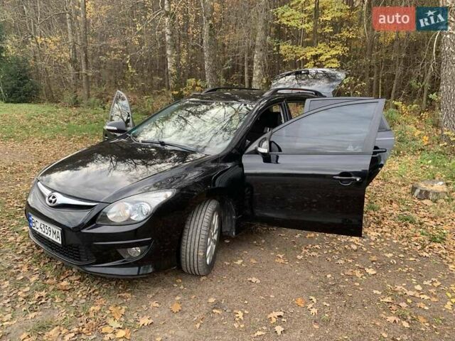 Черный Хендай i30, объемом двигателя 1.58 л и пробегом 235 тыс. км за 6700 $, фото 12 на Automoto.ua