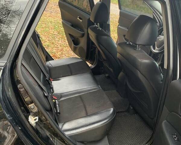 Черный Хендай i30, объемом двигателя 1.58 л и пробегом 235 тыс. км за 6700 $, фото 8 на Automoto.ua