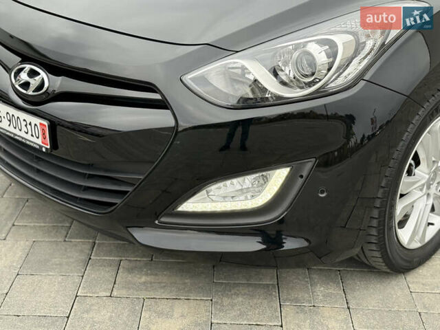Чорний Хендай i30, об'ємом двигуна 1.6 л та пробігом 202 тис. км за 12500 $, фото 7 на Automoto.ua
