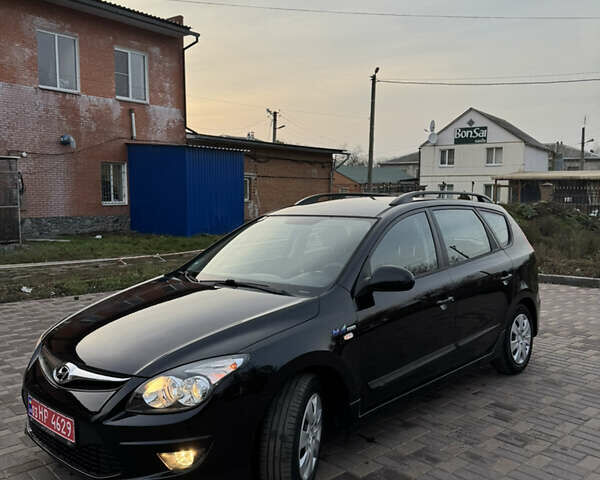 Черный Хендай i30, объемом двигателя 1.4 л и пробегом 210 тыс. км за 6750 $, фото 16 на Automoto.ua