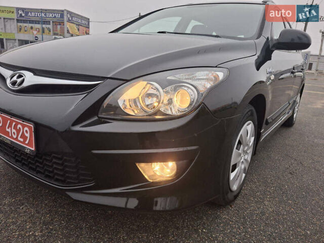 Чорний Хендай i30, об'ємом двигуна 1.4 л та пробігом 209 тис. км за 6850 $, фото 17 на Automoto.ua