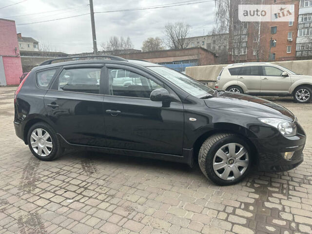 Чорний Хендай i30, об'ємом двигуна 1.58 л та пробігом 175 тис. км за 7500 $, фото 6 на Automoto.ua