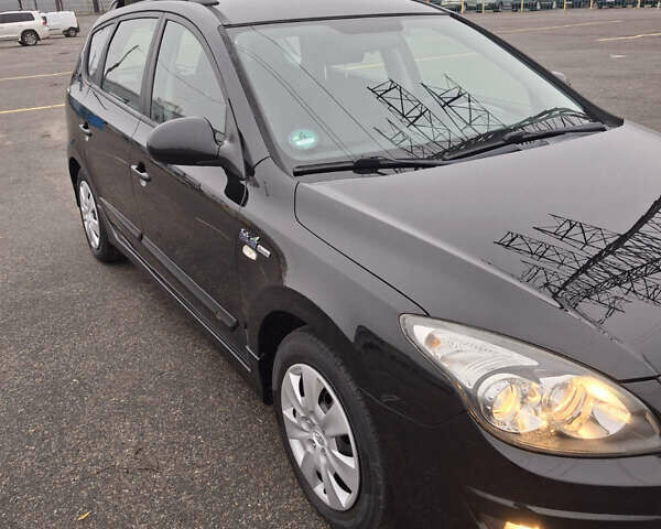 Чорний Хендай i30, об'ємом двигуна 1.4 л та пробігом 209 тис. км за 6850 $, фото 7 на Automoto.ua