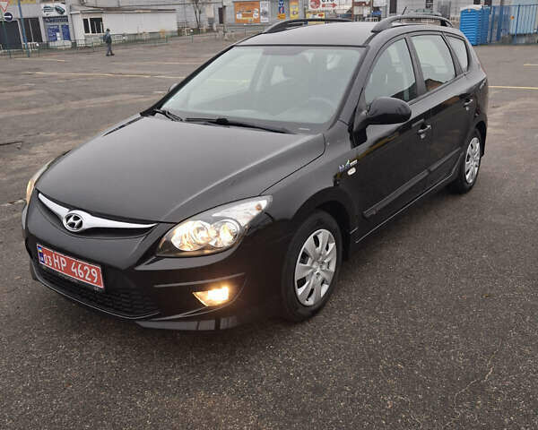 Чорний Хендай i30, об'ємом двигуна 1.4 л та пробігом 209 тис. км за 6850 $, фото 1 на Automoto.ua