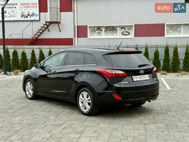 Чорний Хендай i30, об'ємом двигуна 1.6 л та пробігом 202 тис. км за 12500 $, фото 4 на Automoto.ua
