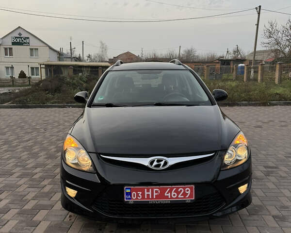 Черный Хендай i30, объемом двигателя 1.4 л и пробегом 210 тыс. км за 6750 $, фото 2 на Automoto.ua