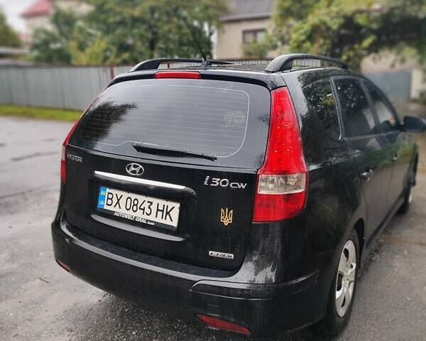 Черный Хендай i30, объемом двигателя 1.58 л и пробегом 210 тыс. км за 7500 $, фото 2 на Automoto.ua