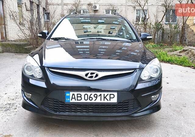 Черный Хендай i30, объемом двигателя 1.4 л и пробегом 275 тыс. км за 6000 $, фото 1 на Automoto.ua