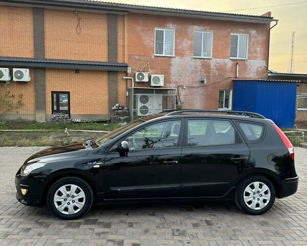 Черный Хендай i30, объемом двигателя 1.4 л и пробегом 210 тыс. км за 6750 $, фото 5 на Automoto.ua