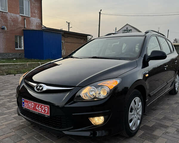 Черный Хендай i30, объемом двигателя 1.4 л и пробегом 210 тыс. км за 6750 $, фото 13 на Automoto.ua