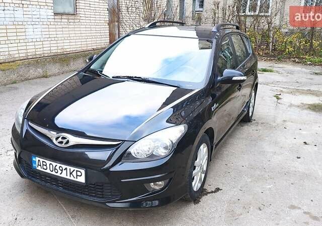 Черный Хендай i30, объемом двигателя 1.4 л и пробегом 275 тыс. км за 6000 $, фото 4 на Automoto.ua
