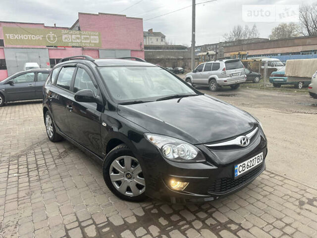 Черный Хендай i30, объемом двигателя 1.58 л и пробегом 175 тыс. км за 7500 $, фото 2 на Automoto.ua