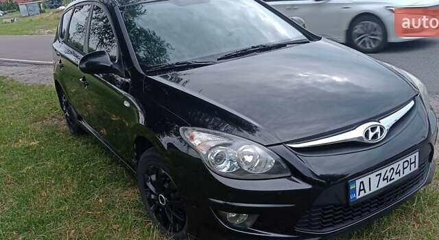 Чорний Хендай i30, об'ємом двигуна 1.59 л та пробігом 145 тис. км за 6499 $, фото 1 на Automoto.ua