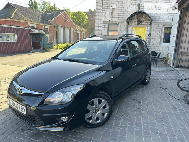 Чорний Хендай i30, об'ємом двигуна 1.58 л та пробігом 175 тис. км за 7500 $, фото 1 на Automoto.ua