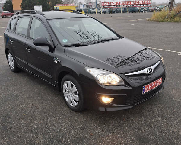 Чорний Хендай i30, об'ємом двигуна 1.4 л та пробігом 209 тис. км за 6850 $, фото 2 на Automoto.ua