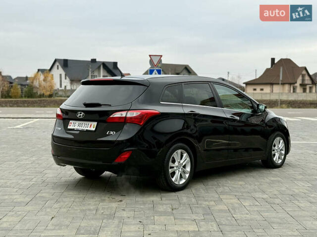 Чорний Хендай i30, об'ємом двигуна 1.6 л та пробігом 202 тис. км за 12500 $, фото 2 на Automoto.ua