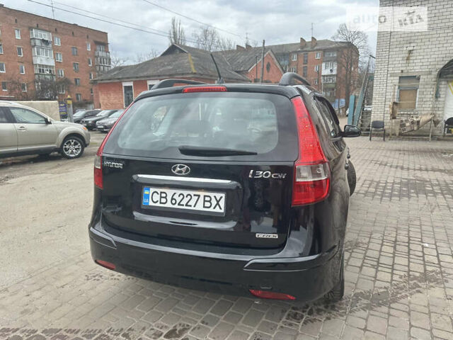 Чорний Хендай i30, об'ємом двигуна 1.58 л та пробігом 175 тис. км за 7500 $, фото 13 на Automoto.ua