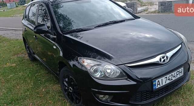Чорний Хендай i30, об'ємом двигуна 1.59 л та пробігом 145 тис. км за 6499 $, фото 3 на Automoto.ua