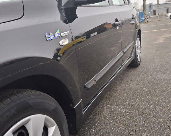 Чорний Хендай i30, об'ємом двигуна 1.4 л та пробігом 209 тис. км за 6850 $, фото 9 на Automoto.ua