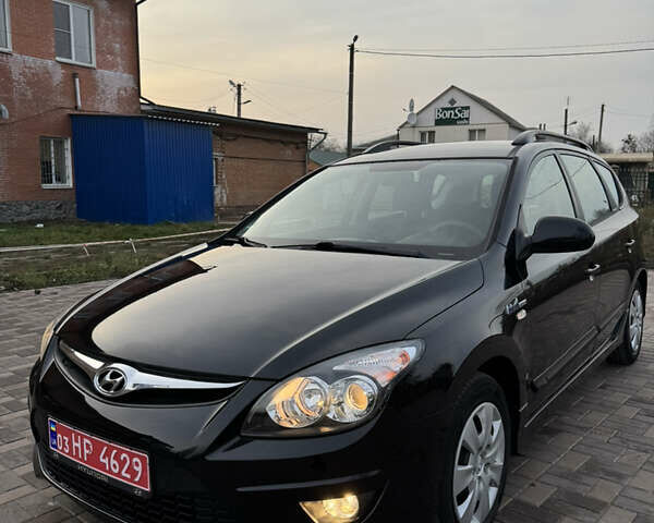 Черный Хендай i30, объемом двигателя 1.4 л и пробегом 210 тыс. км за 6750 $, фото 1 на Automoto.ua