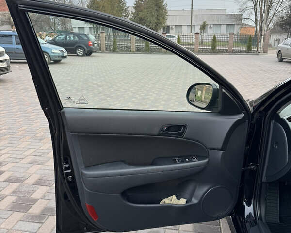 Черный Хендай i30, объемом двигателя 1.4 л и пробегом 210 тыс. км за 6750 $, фото 22 на Automoto.ua
