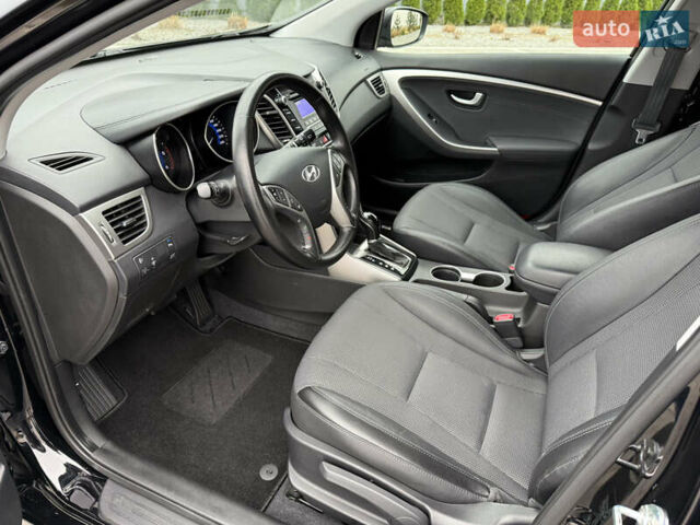Чорний Хендай i30, об'ємом двигуна 1.6 л та пробігом 202 тис. км за 12500 $, фото 14 на Automoto.ua