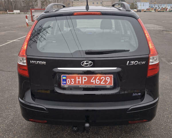 Чорний Хендай i30, об'ємом двигуна 1.4 л та пробігом 209 тис. км за 6850 $, фото 3 на Automoto.ua